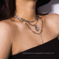 Collar de borla de cadena gruesa geométrica creativa para mujeres, corazón de durazno abierto de hebilla mixta collar